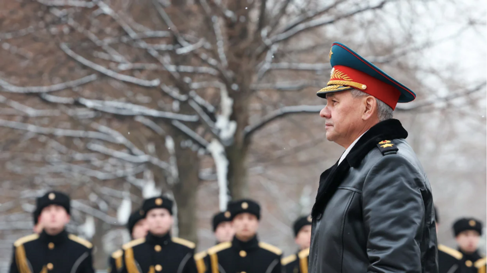 Russia's Defence Minister Sergei Shoigu attends a ceremony to leave floral tributes at the Tomb of the Unknown Soldier on Defender of the Fatherland Day.