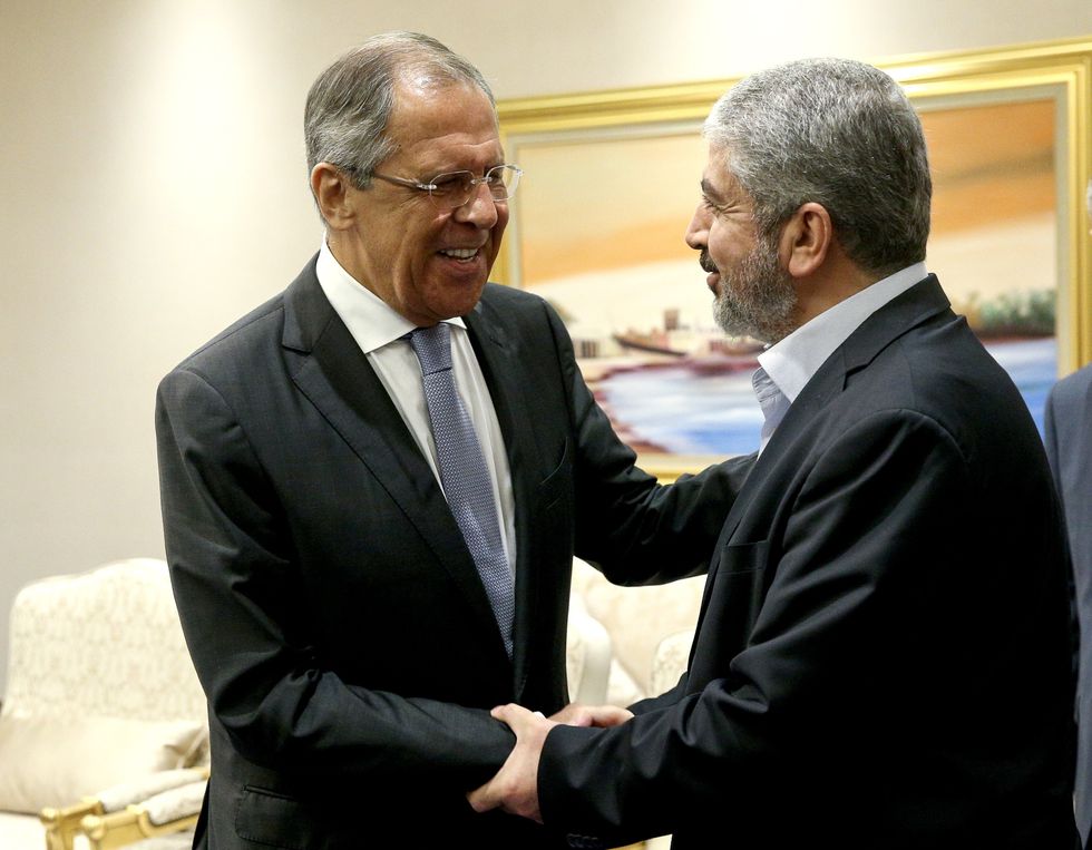 Russia's Foreign Minister Sergei Lavrov (L) shaking hands with Khaled Mashal, leader of the Islamic Palestinian organization Hamas, in August 2015.​