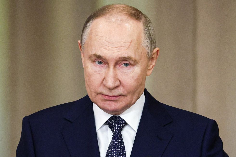Russia's President Vladimir Putin attends an annual meeting of judges of general jurisdiction, military and arbitration courts at the Supreme Court of Russia.