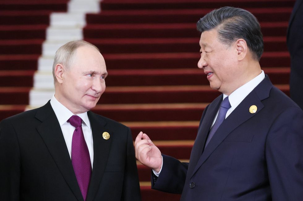 Russia's President Vladimir Putinand China's President Xi Jinpingduring a ceremony to welcome the heads of delegation to the third Belt and Road Forum at the Great Hall of the People