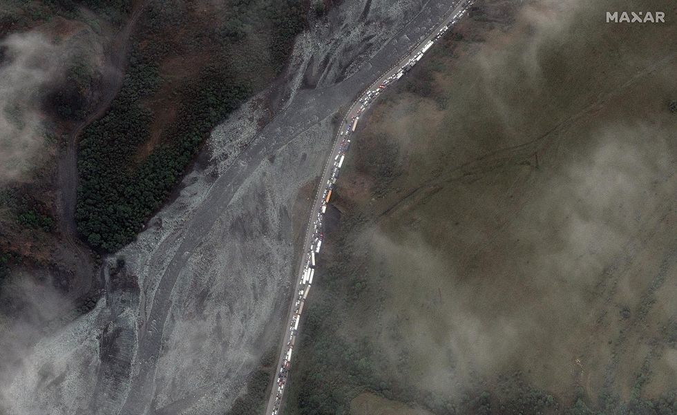 Satellite images show a large traffic jam of cars attempting to cross the border into Georgia following Putin's announcement of mass mobilization