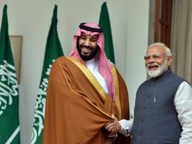 Saudi Crown Prince Mohammed bin Salam shaking hands with India's Prime Minister Narendra Modi