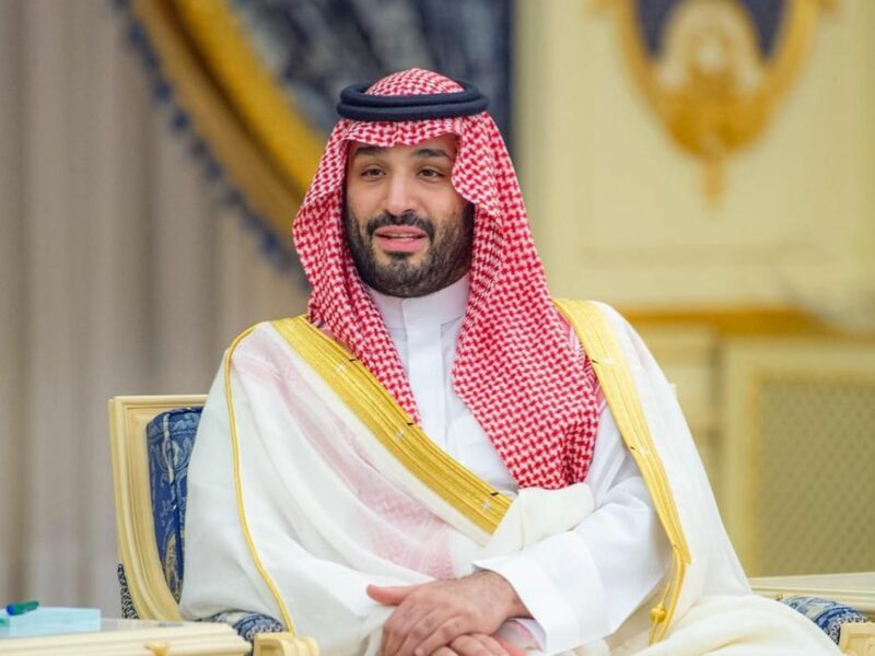 Saudi Crown Prince Mohammed bin Salman sitting with hands crossed