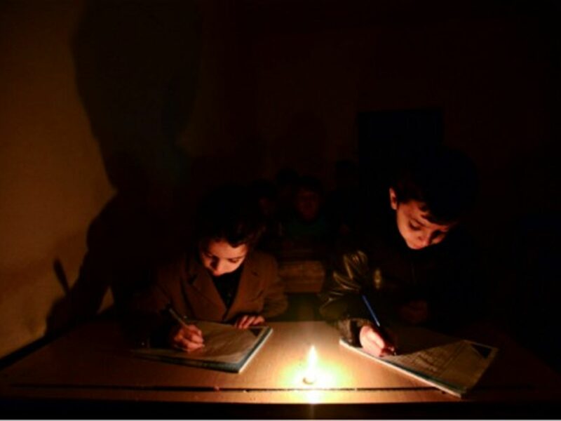 Schoolchildren studying without electricity in Aleppo, Syria