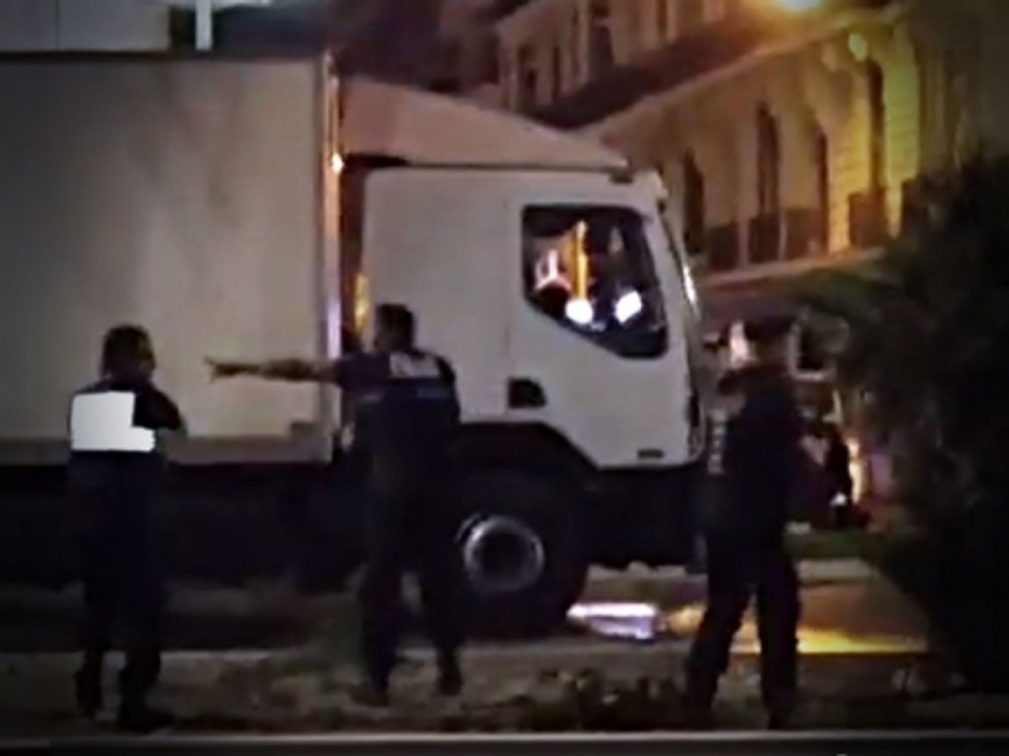 Screen shot of police showdown with the driver of the truck