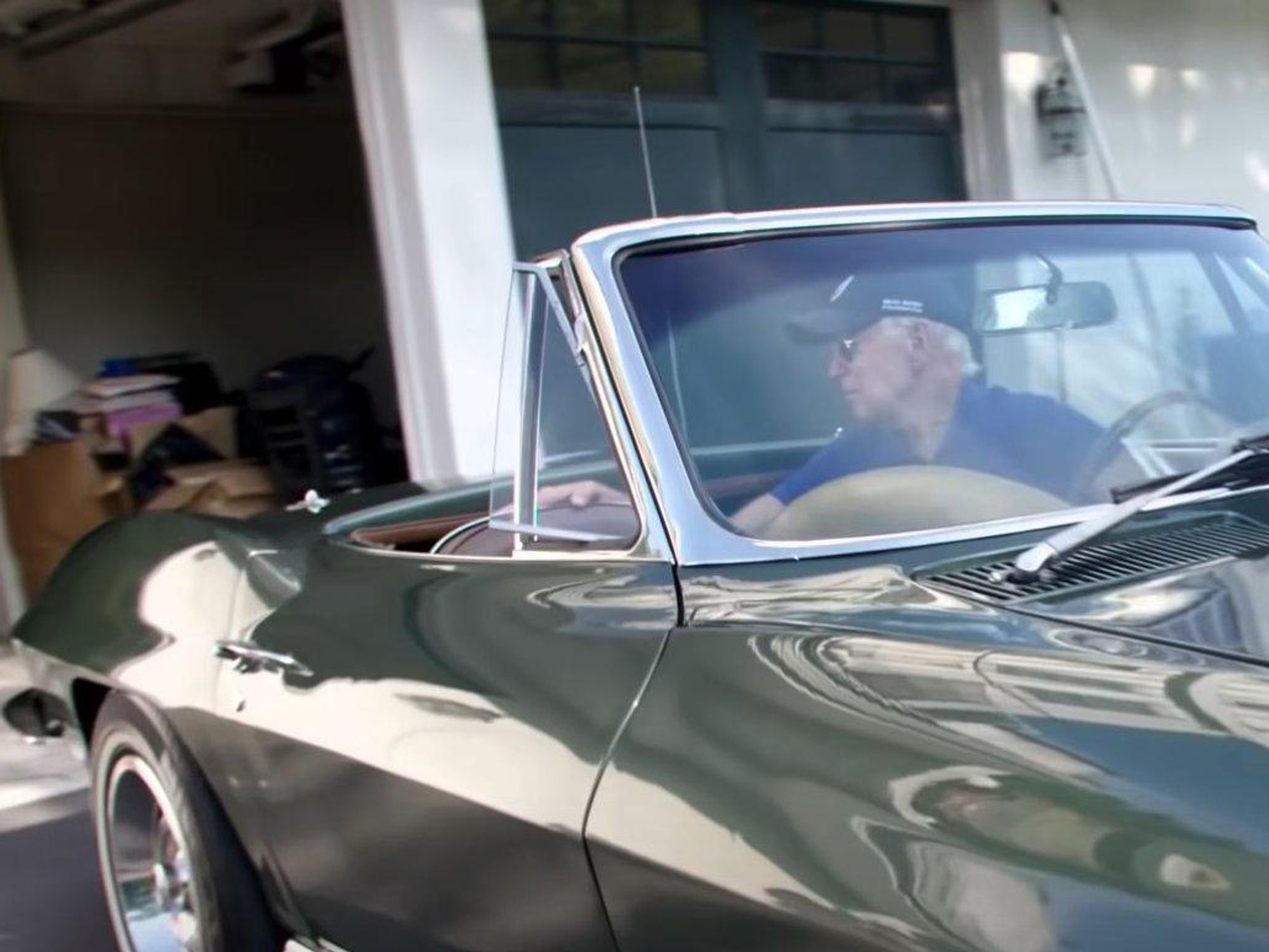 Screenshot of a campaign video for Joe Biden that shows him and his Corvette near the incriminated garage