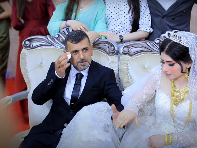 Screenshot of a video of Dakhil and Samia renewing their wedding vows