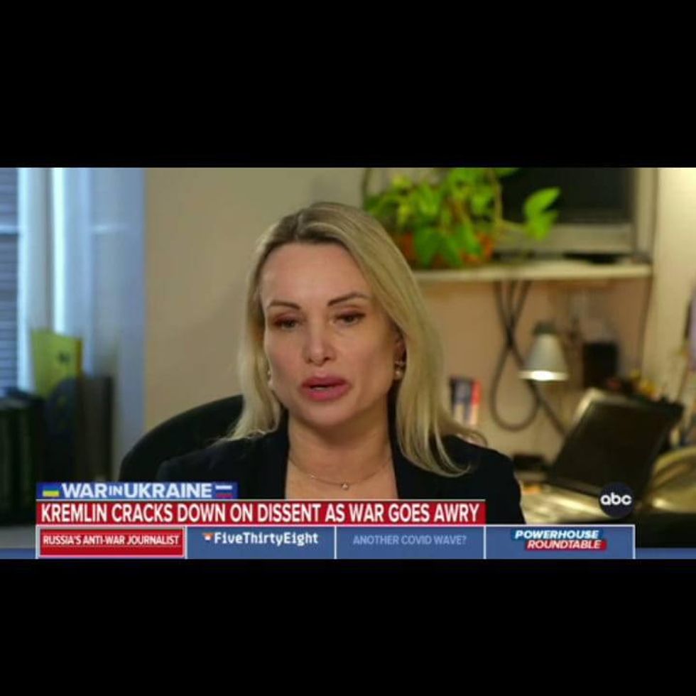 Screenshot of Marina Ovsyannikova speaking on television.