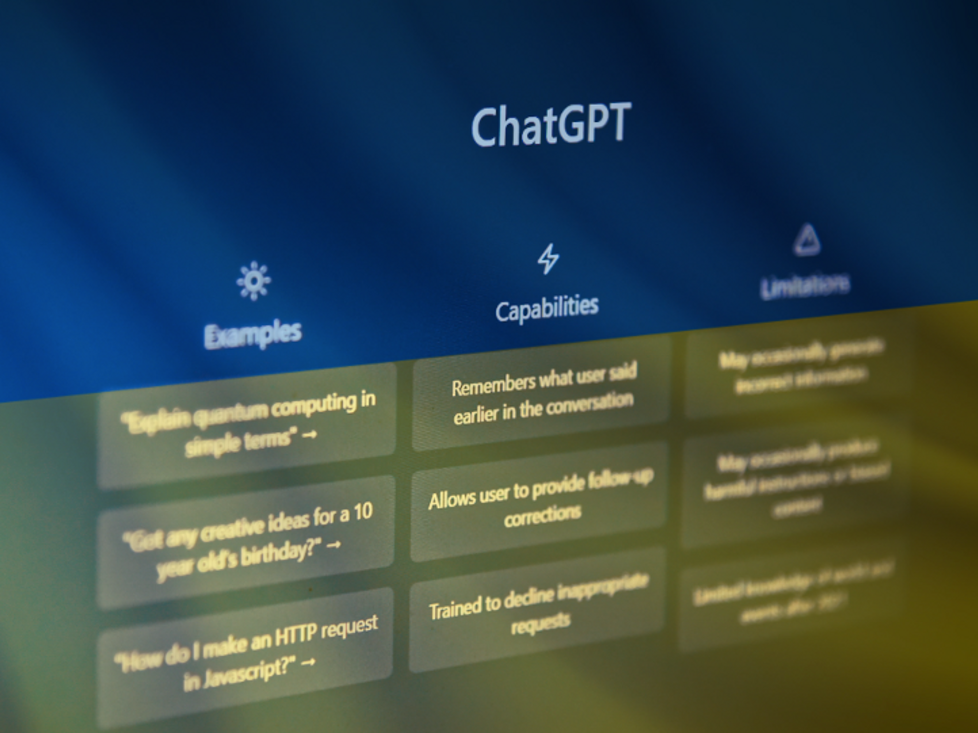 Screenshot of OpenAI's ChatGPT homepage with a flag of Ukraine in the background