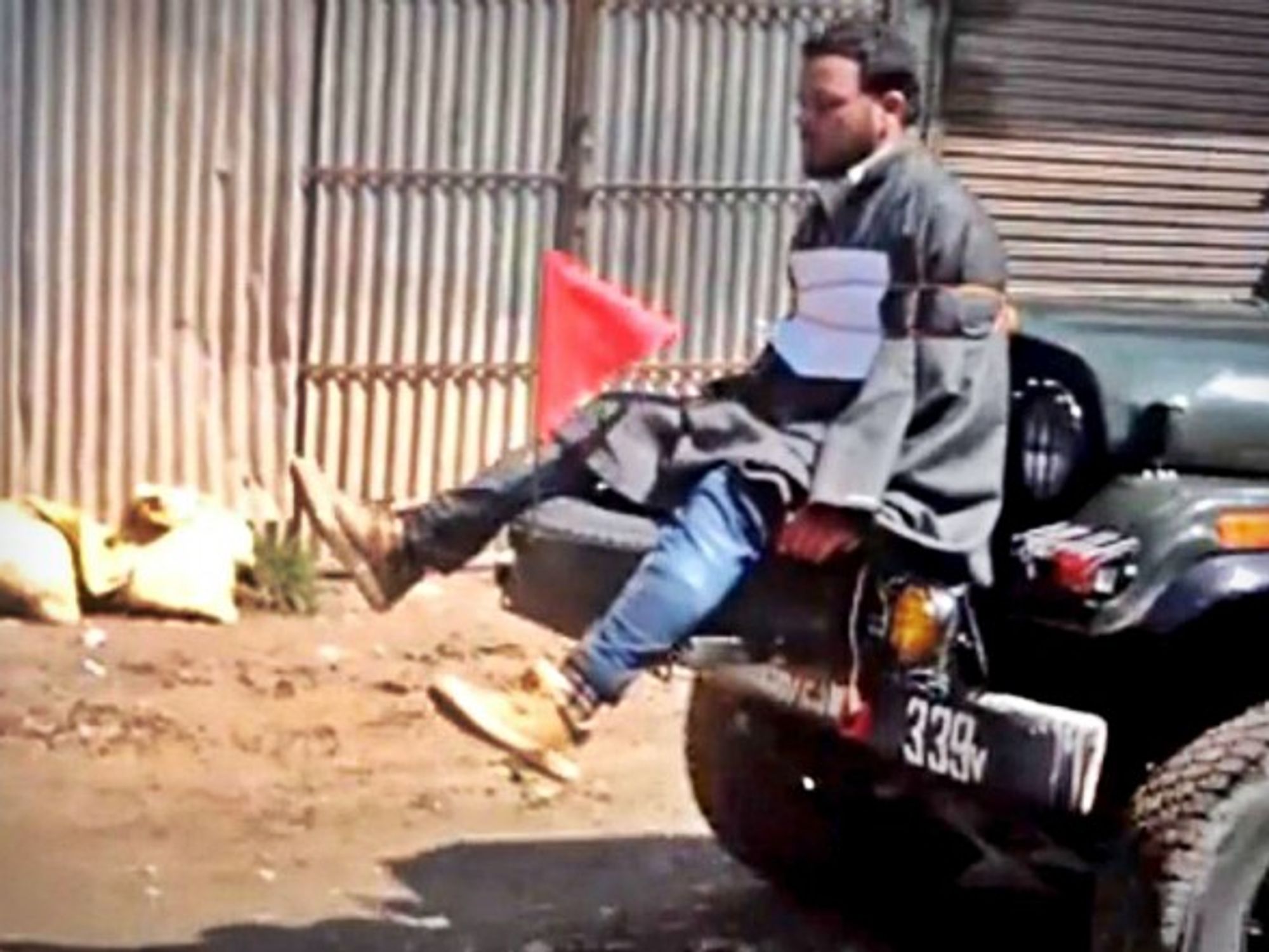 Screenshot of video of Farooq Ahmad Dar being used as human shield