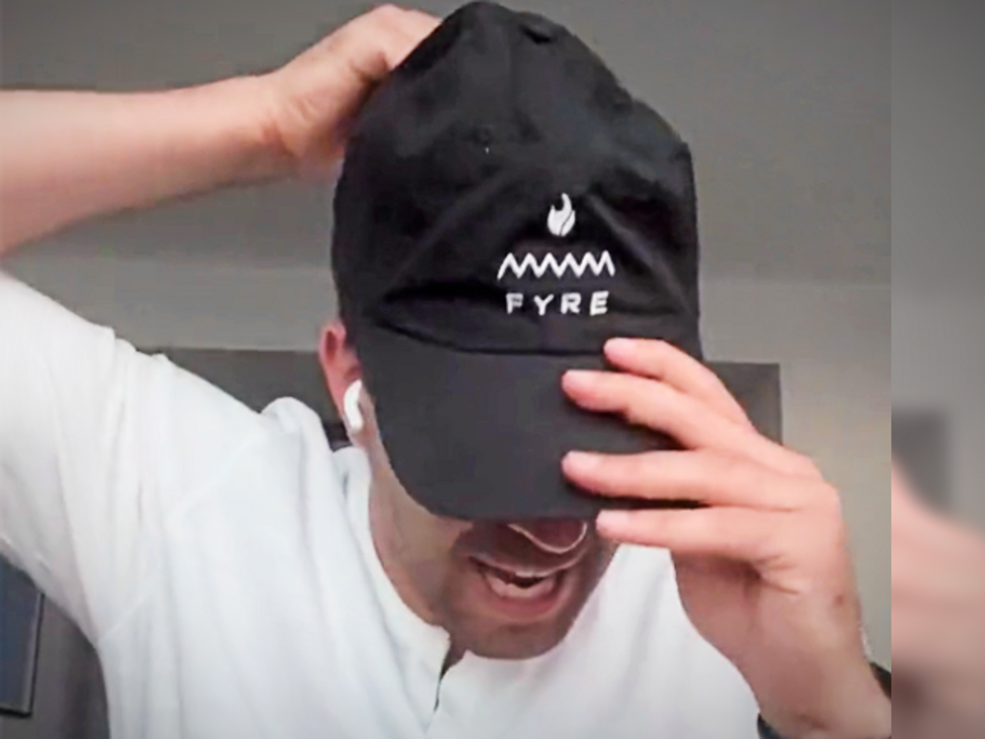 Screeshot of a video posted on X/Twitter showing infamous ​Fyre Festival organizer Billy McFarland announcing a second edition
