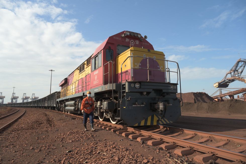 Sea-rail intermodal trains are used to transport iron ore at the Luoyu operating area in the Fujian province.