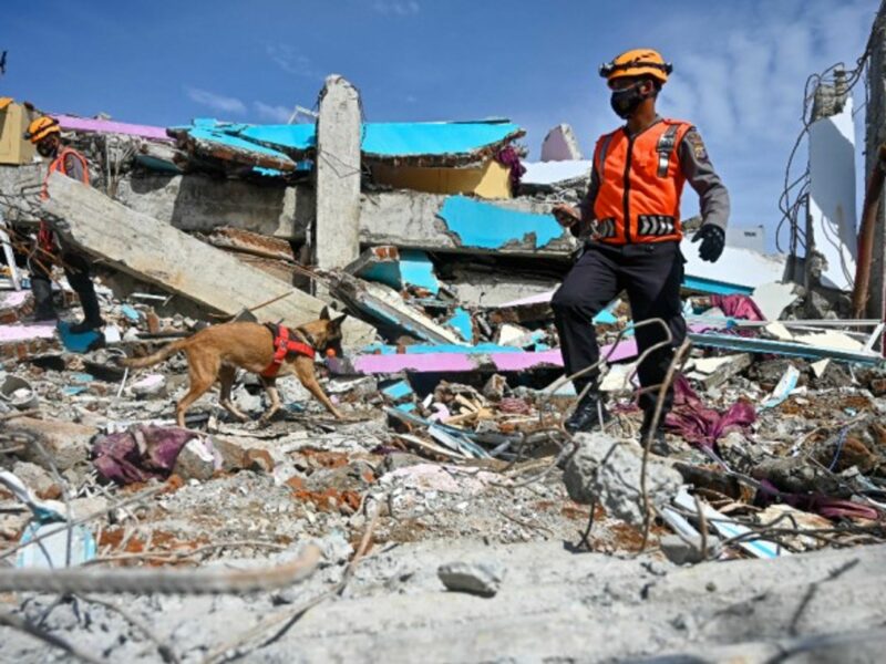Searching for victims in the rubble in Mamuju after the Indonesian island of Sulawesi was hit by a 6.2 magnitude earthquake on Jan. 15, killing at least 81.