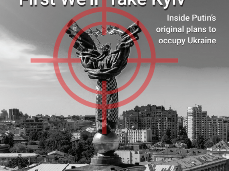 Seen on the city of kyiv, in the foreground a historical monument with a red target aiming at it