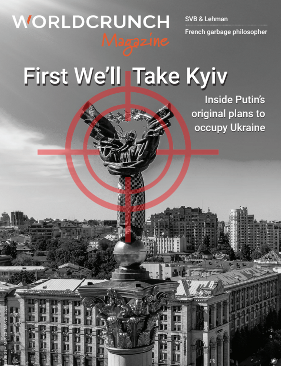 Seen on the city of kyiv, in the foreground a historical monument with a red target aiming at it