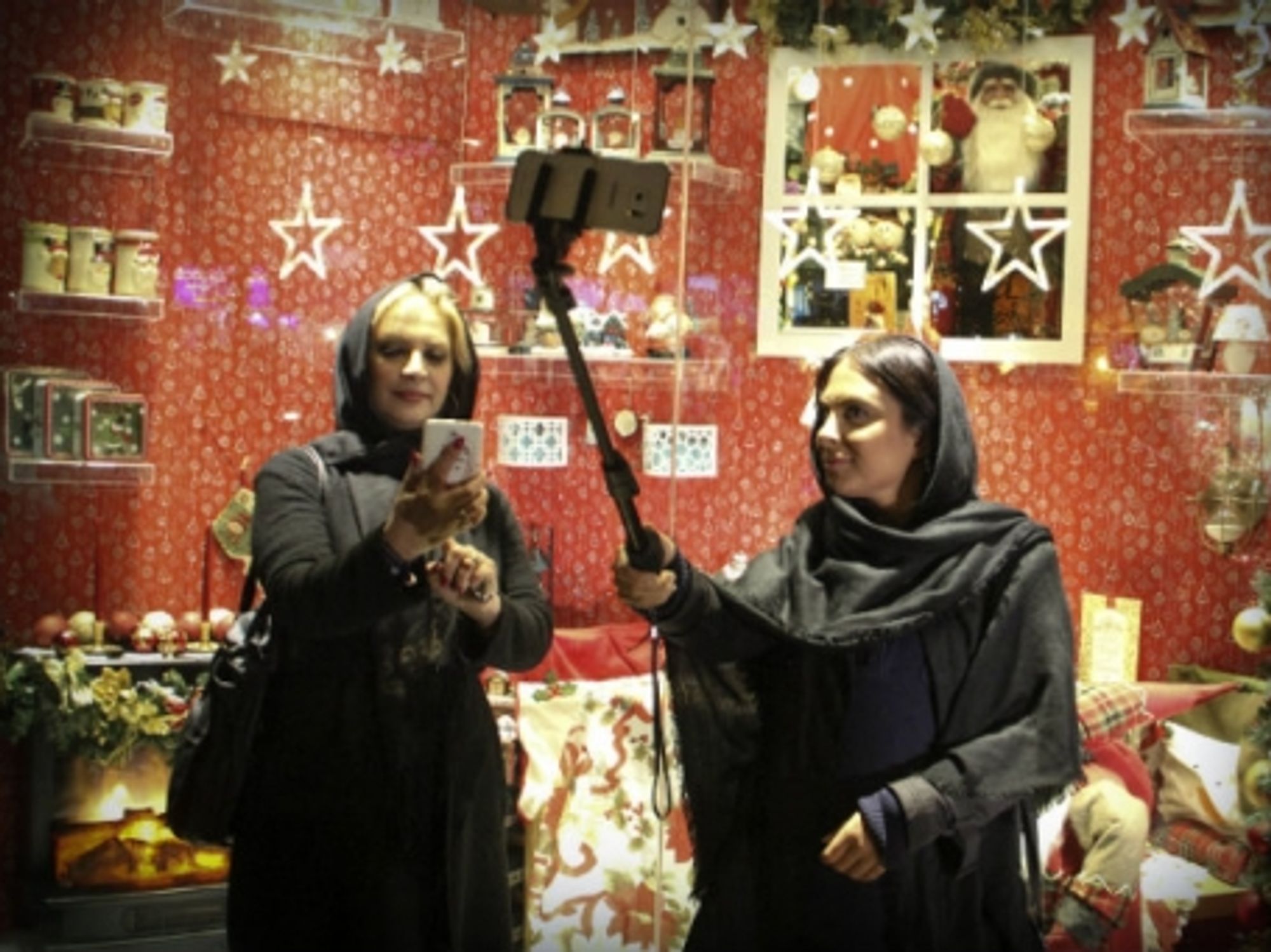 Selfie sticks and holiday cheer in Tehran in December
