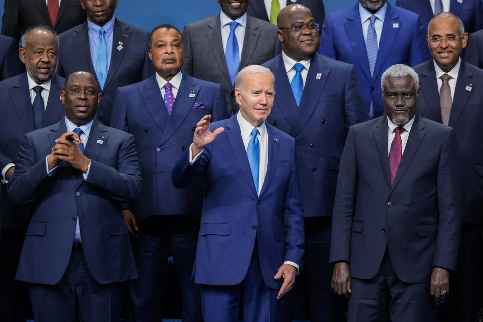 Senegalese President Macky Sall, United States President Joe Biden, and Moussa Faki Mahamat, Chairperson of the African Union Commission, pose for a photo at the US-Africa Summit Leaders in Washington, December 2020.