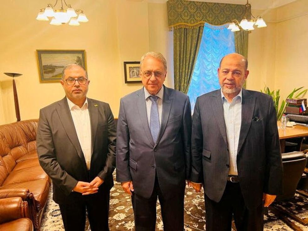 Senior Hamas officials Hamas Bassem Naïm (left) and Moussa Abou Marzouk with Russian deputy Foreign Minister Mikhaïl Bogdanov