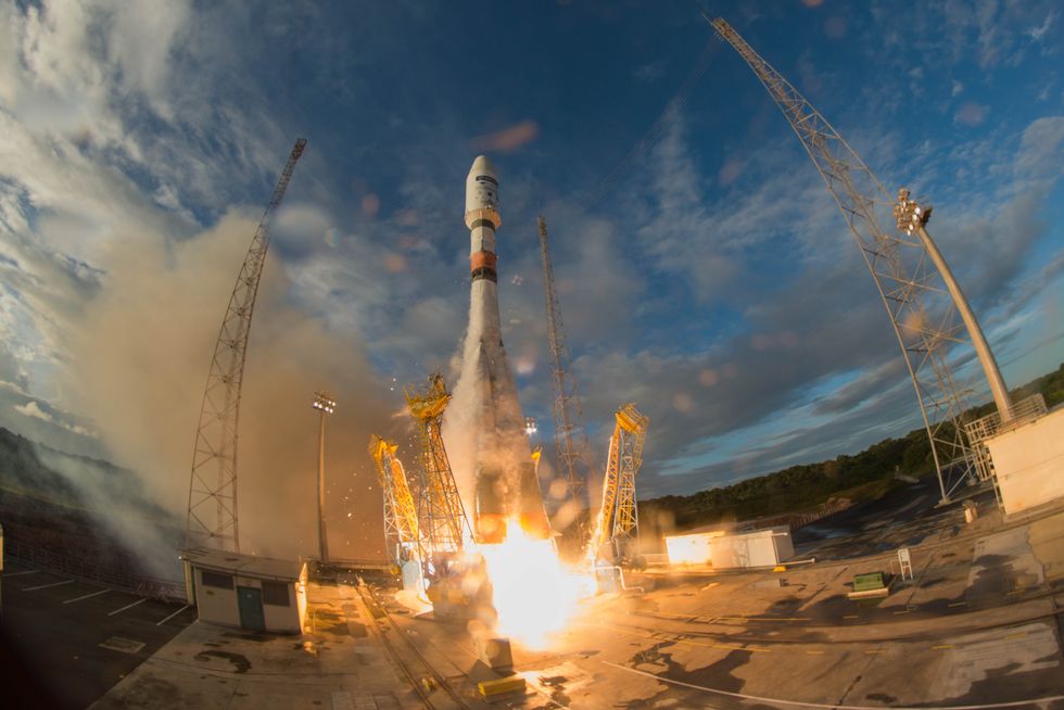 Sentinel-1B being launched into space on a slightly cloudy day.