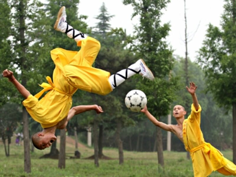 Shaolin students playing soccer at the Tagou Wushu School in Dengfeng
