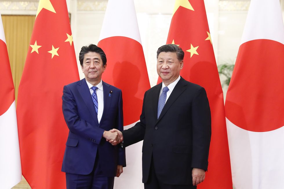 Shinzo Abe and Xi Jinping.