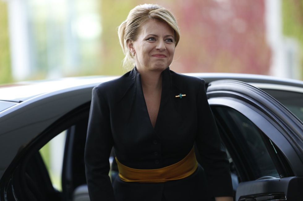 Slovakian President Zuzana Czaputova steps out of a car in Berlin.