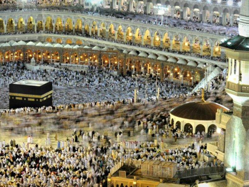 Slow-shutter speed photo of pilgrims walking around the Kaaba in Mecca
