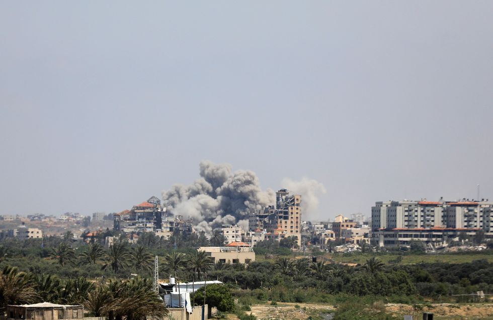 Smoke rises after an Israeli strike near the Nuseirat refugee camp in central Gaza Strip, April 14, 2024