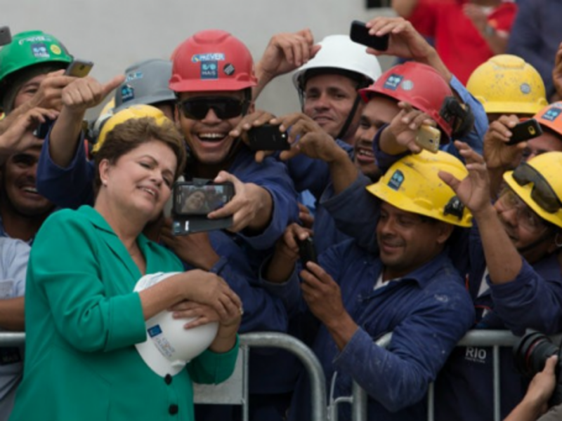 Snapshot: Brazil Vote, Kurds Flee, Japanese Eruption