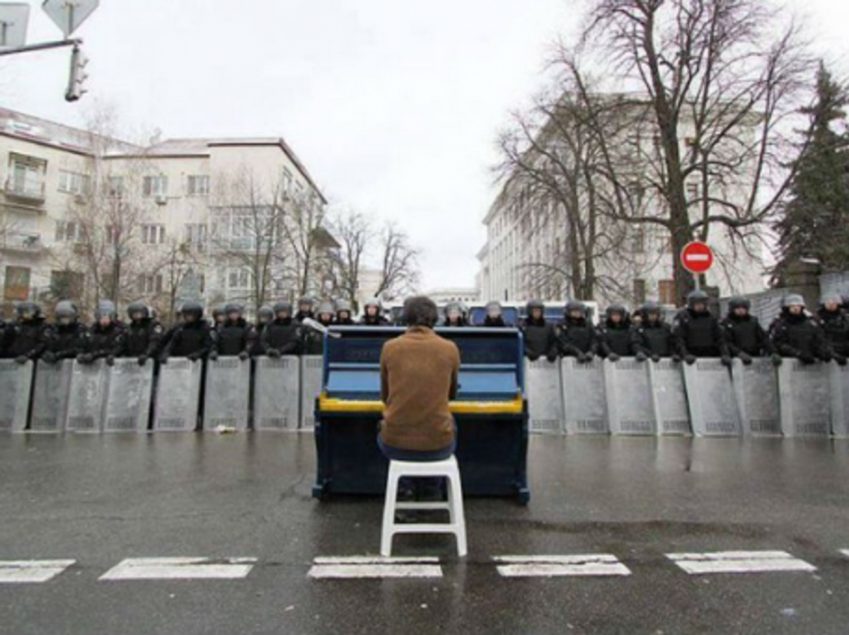 Snapshot Of The World: Kiev Protests, Mourning Mandela, Holy Snow