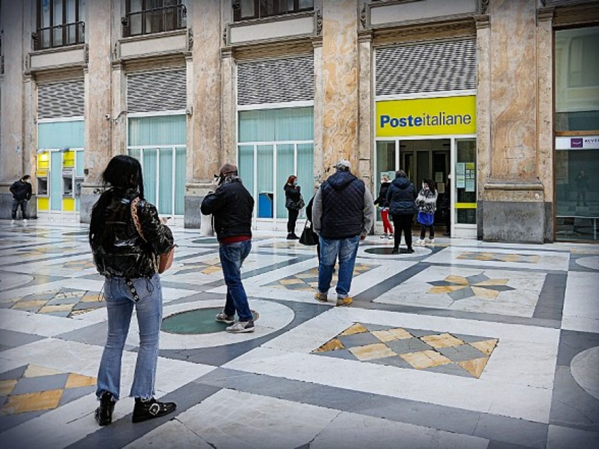 Social distancing brings more orderly lines to Naples, Italy