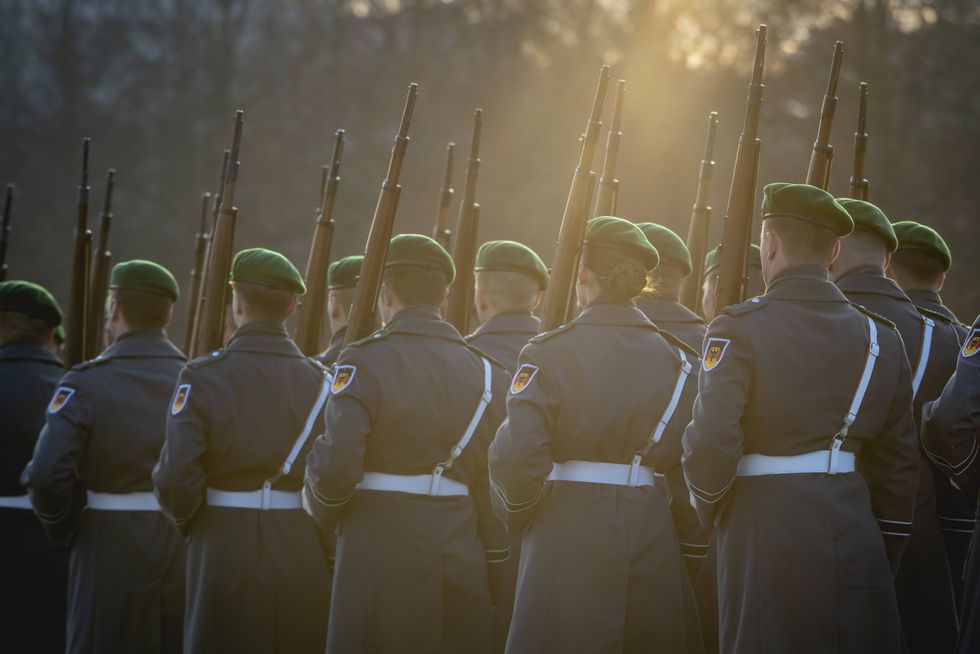 Soldiers from the Bundeswehr Guard Battalion arrive for a reception in the Bendlerblock in Berlin on February 10, 2025.