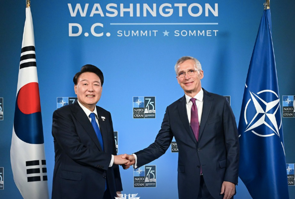 South Korean President Yoon Suk Yeol meets with NATO Secretary General Jens Stoltenberg on the sidelines of the Washington NATO summit