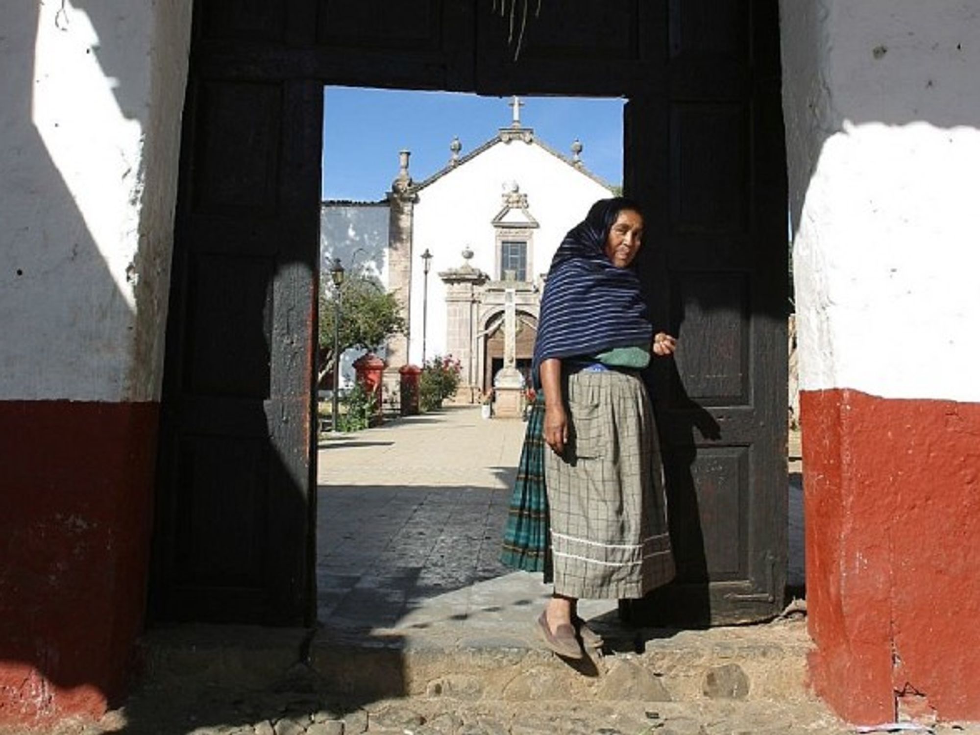 Standing in the doorway, in Michoacán, Mexico