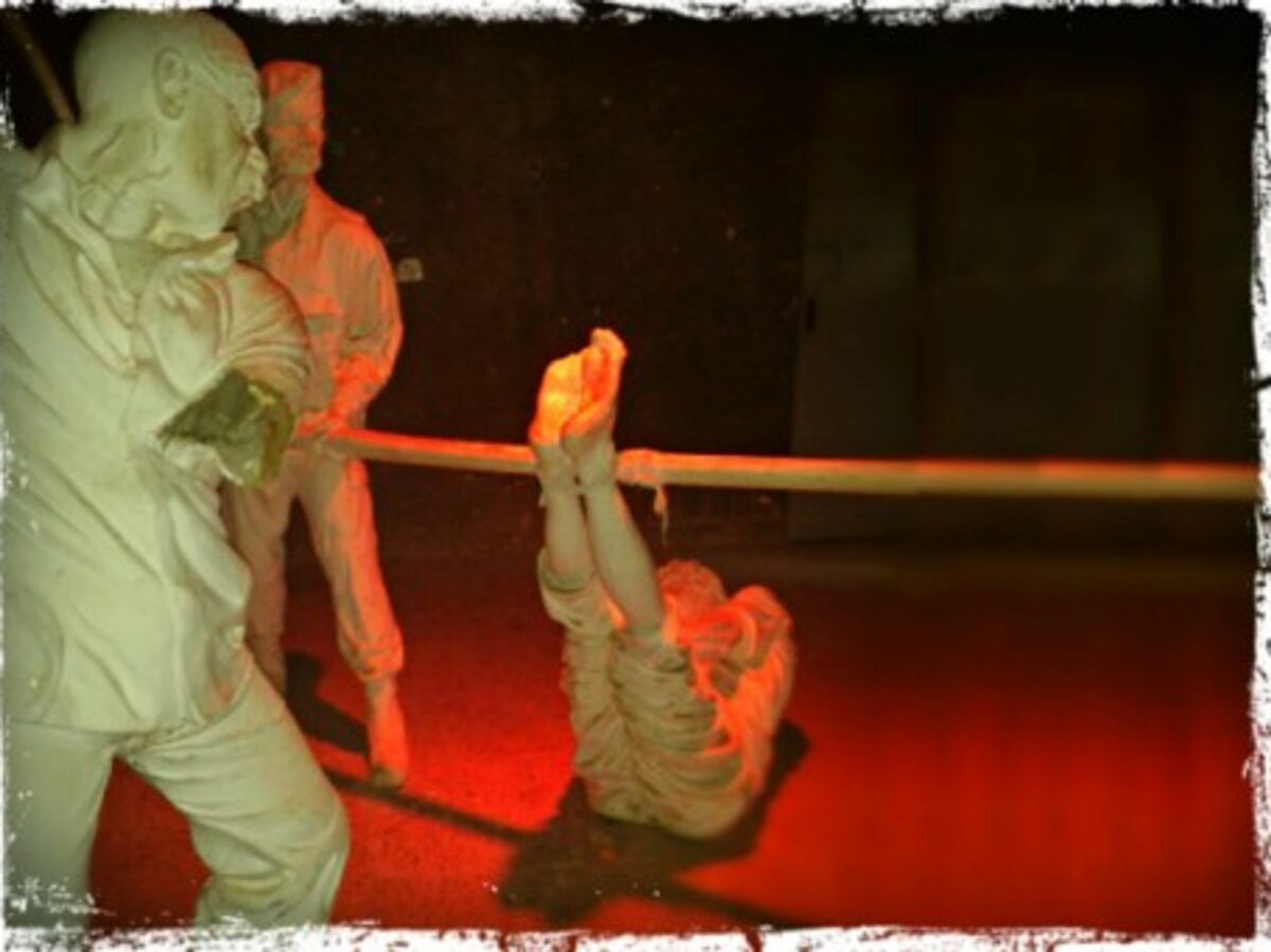 Statues in a Syrian museum showing torture methods of detainees