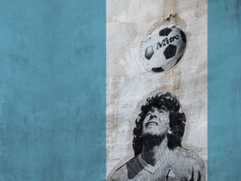 Stencil of Maradonna on a wall in Naples