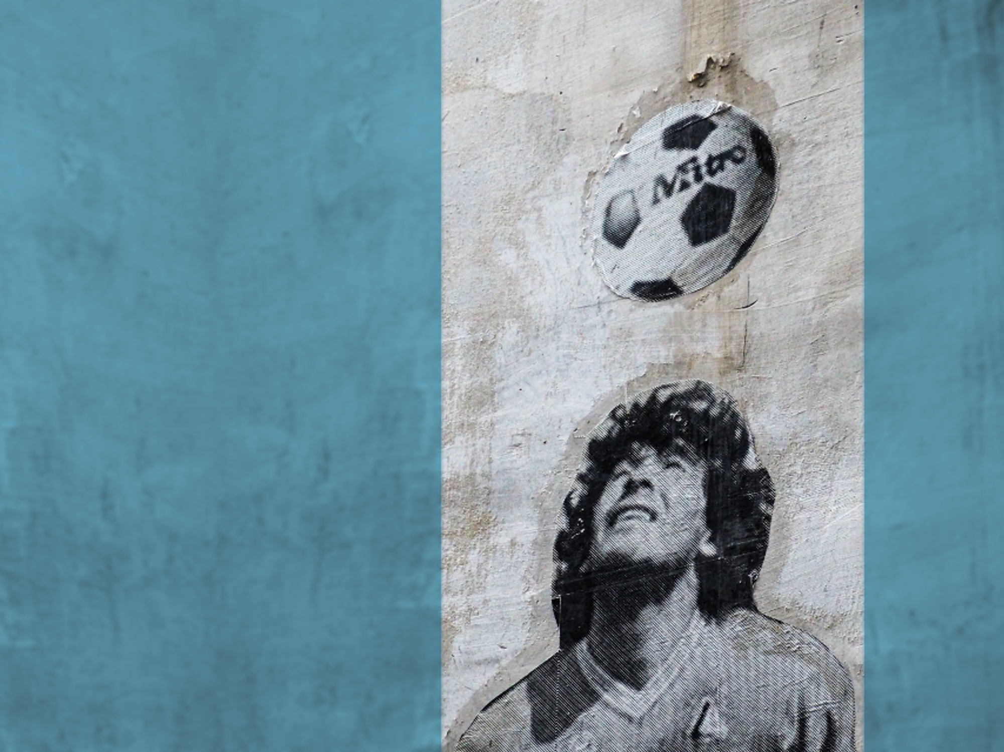 Stencil of Maradonna on a wall in Naples
