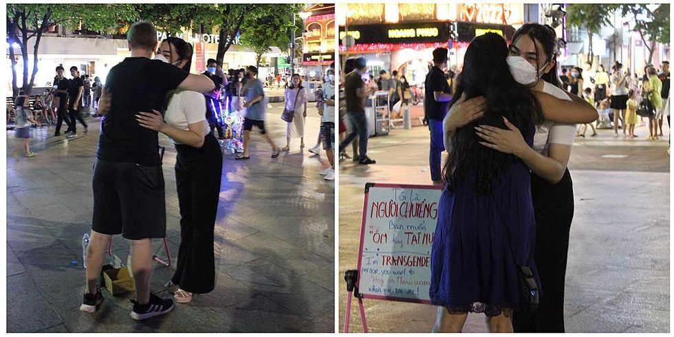 Strangers hug trans woman Do Ba Duy on Nguyen Hue Street