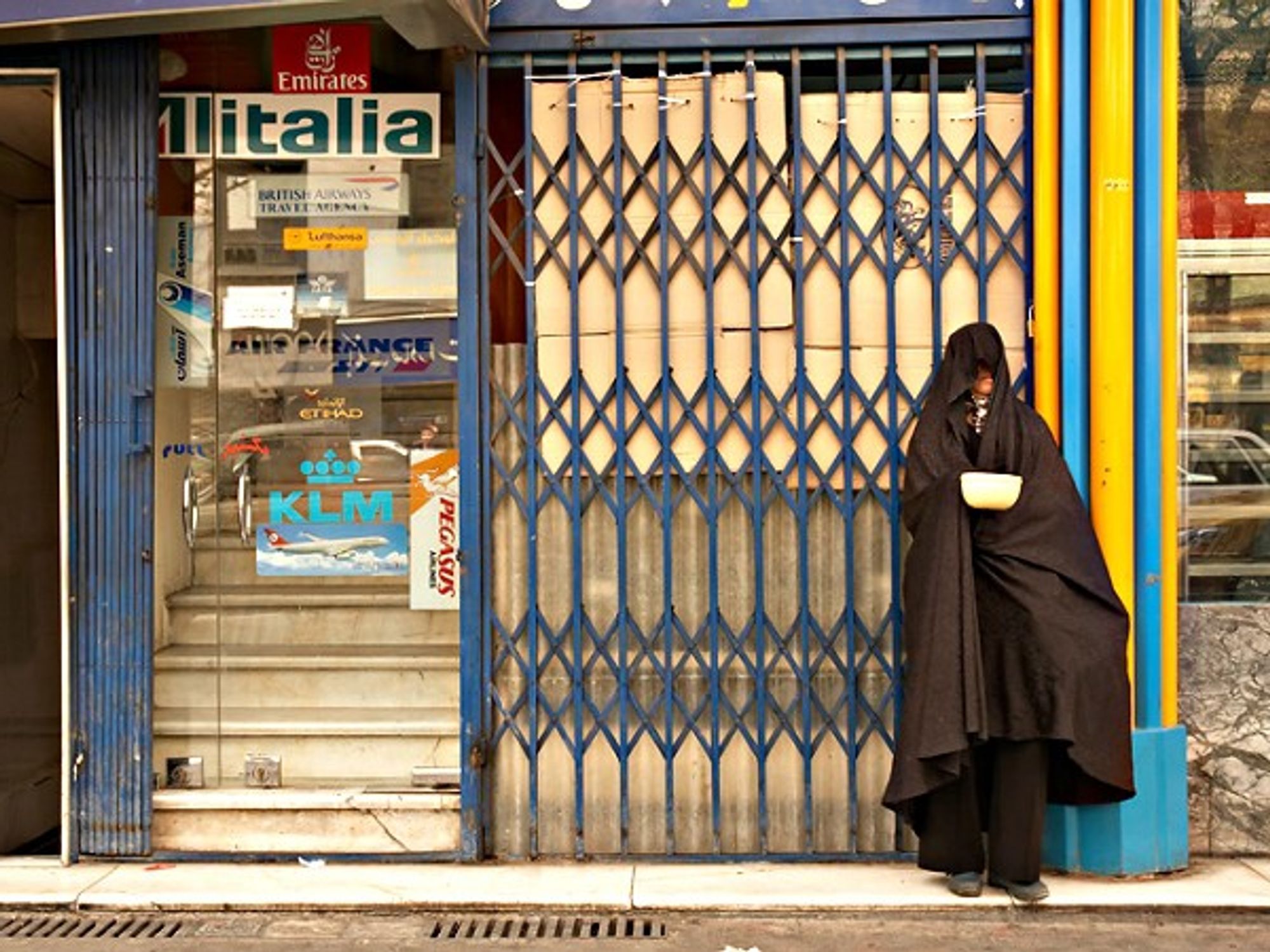 Street beggar wearing a hijab in Tehran
