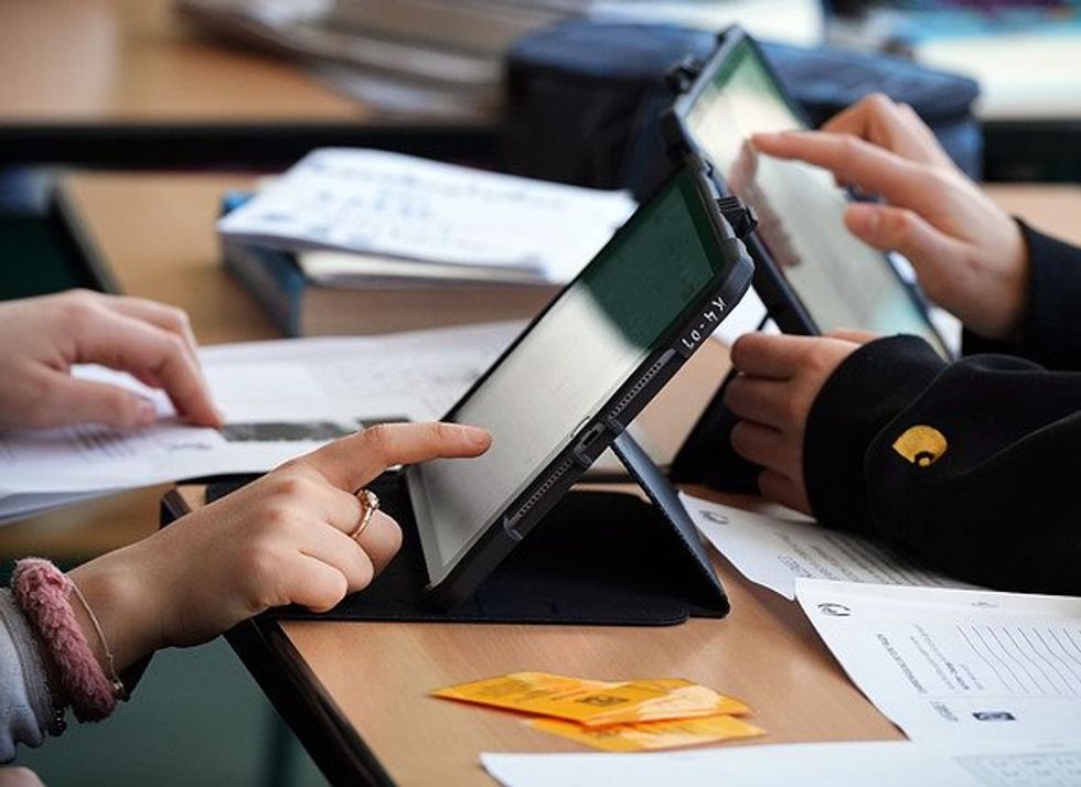 Student using a tablet at school in Berlin.