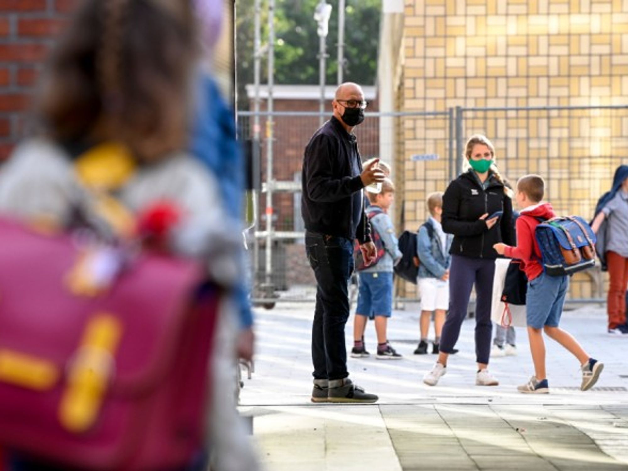 Students arriving for their first day of school in Belgium.