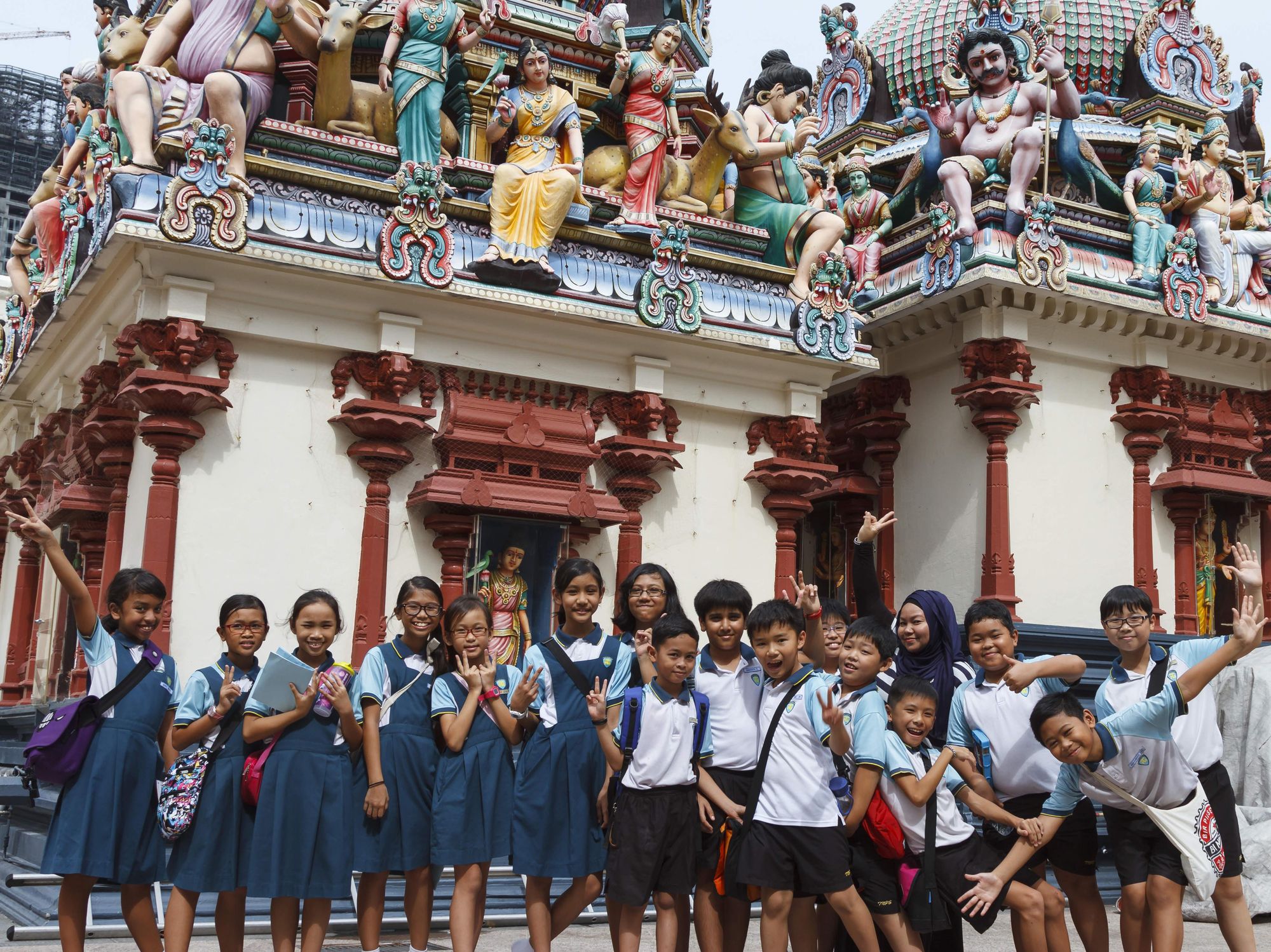 Students at Sri Mariamman Hindu temple in Singapore