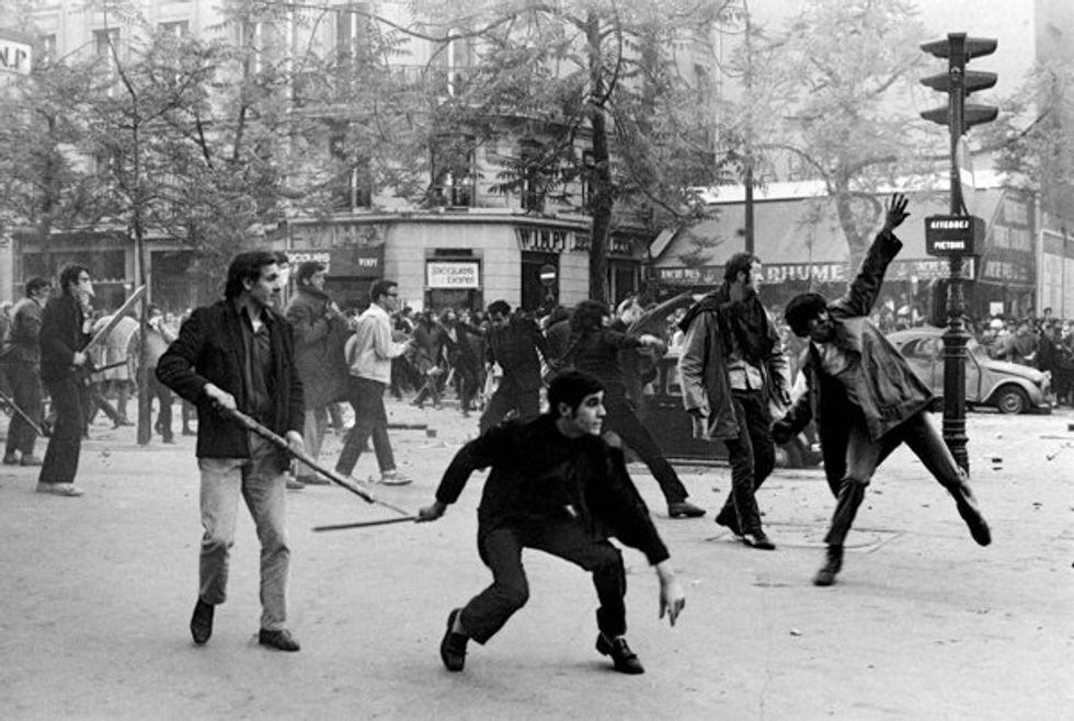 Students hurling projectiles against the police in Paris' Boulevard Saint Germain on May 6th 1968.