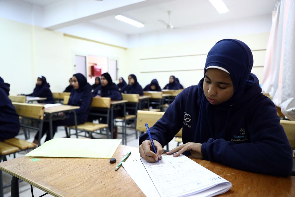 Students learn to make and design jewelry at Egypt Gold near Cairo, capital of Egypt,