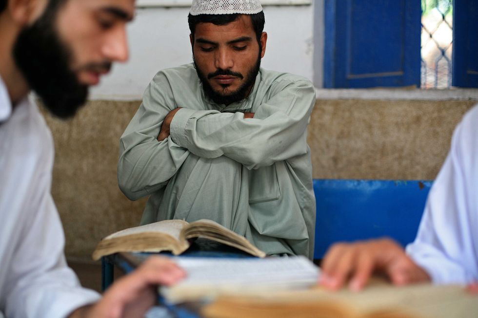 Students reading the Quran in Lahore, Pakistan