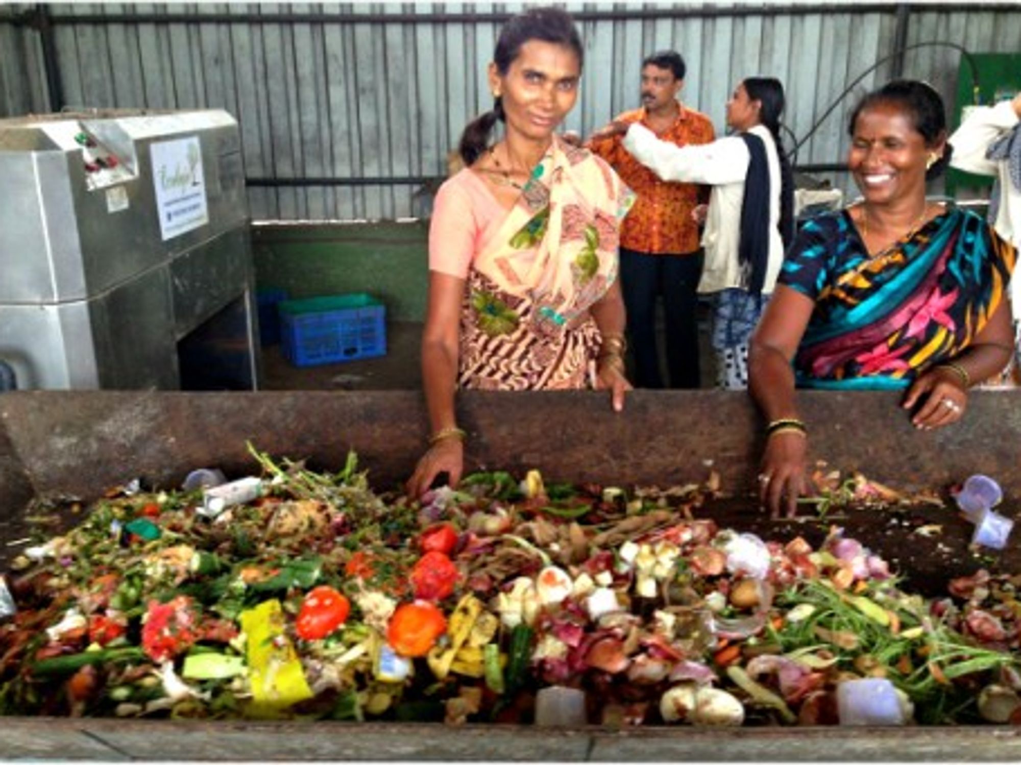Sudjata Imtiaz Khan (right) and her friend Surekha sorting the waste