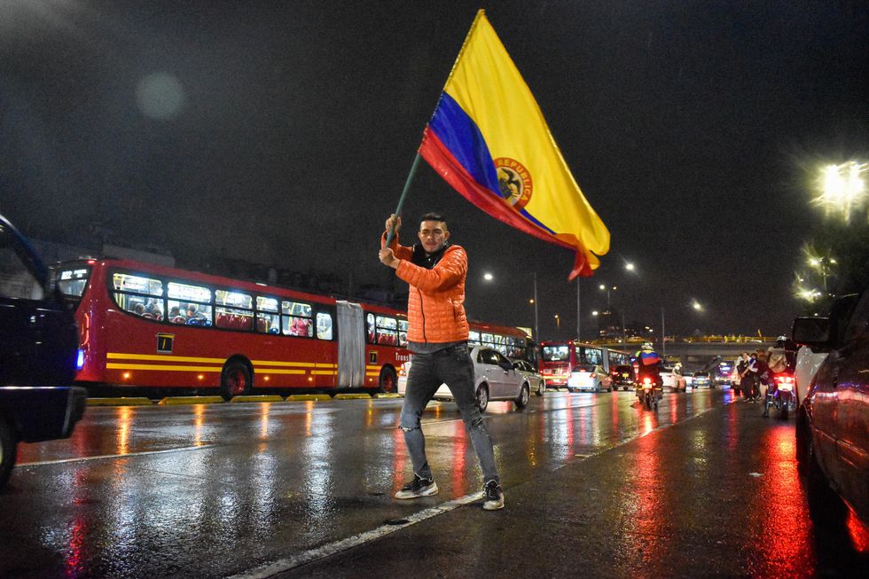 Supporters of Gustavo Petro, Colombia's new left-wing president, celebrate his victory in Bogota, Colombia on Monday.
