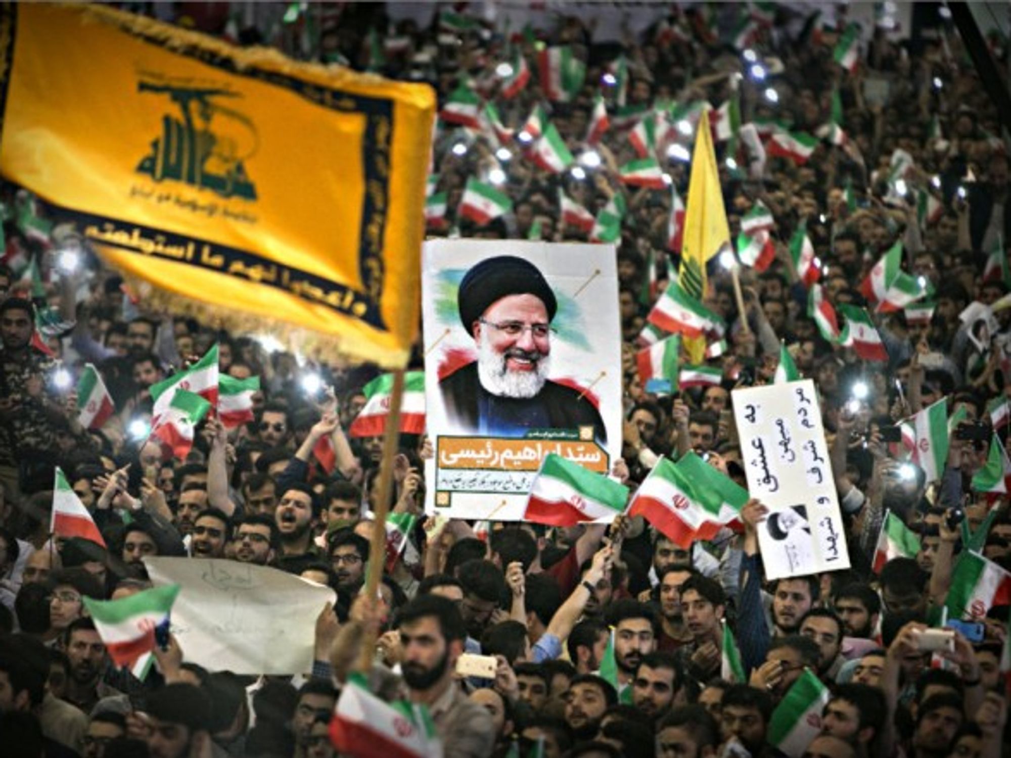 Supporters of Iran's presidential challenger Ebrahim Reisi