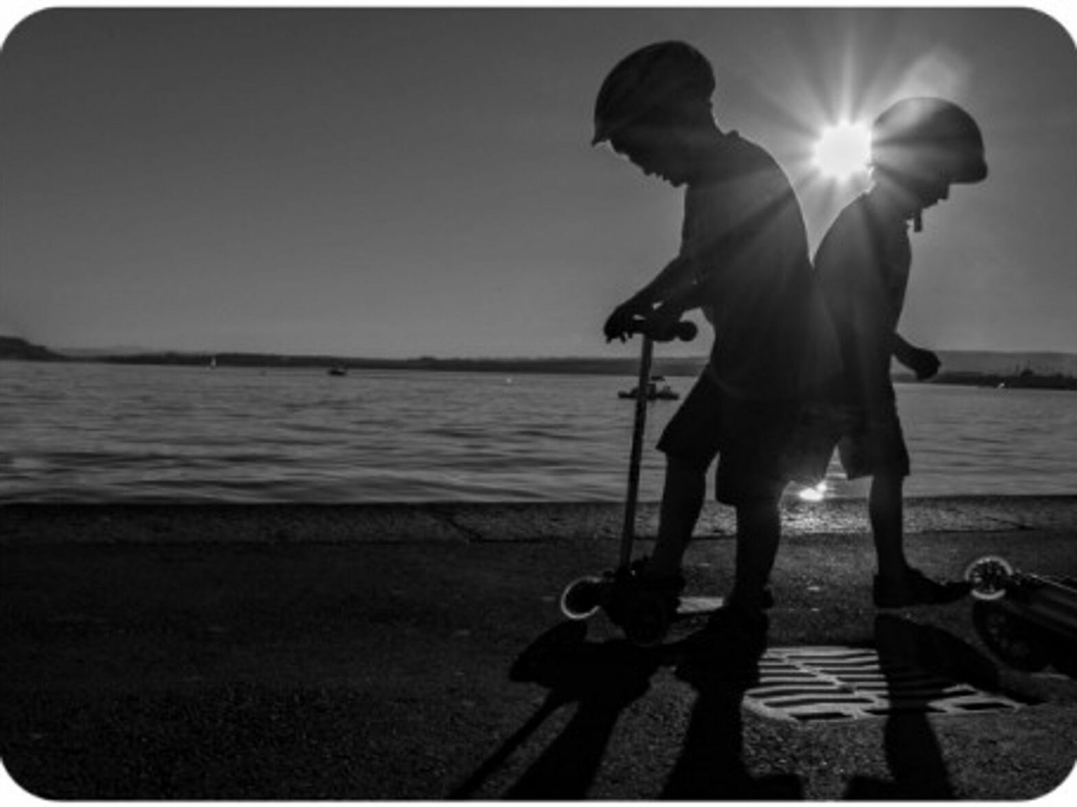 Swiss kids playing by Lake Zug