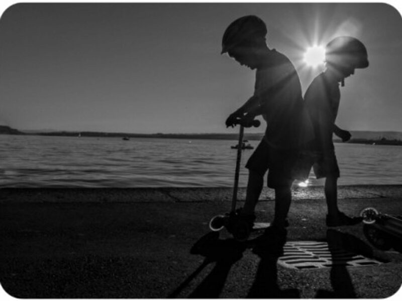 Swiss kids playing by Lake Zug